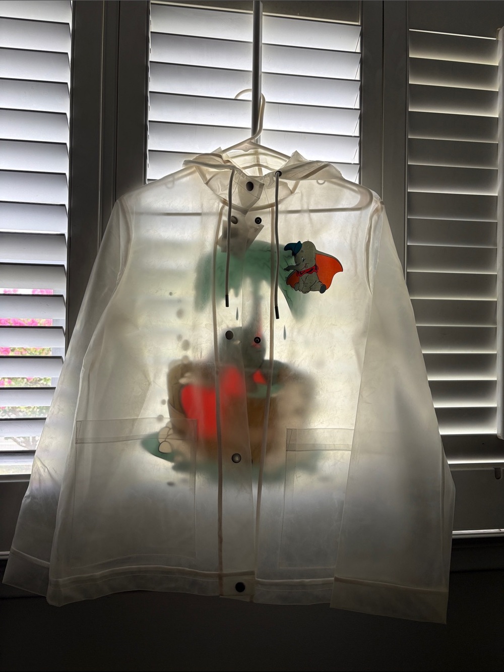 Disney Clear Dumbo Rain Jacket with Red and Teal Accents size medium NWT